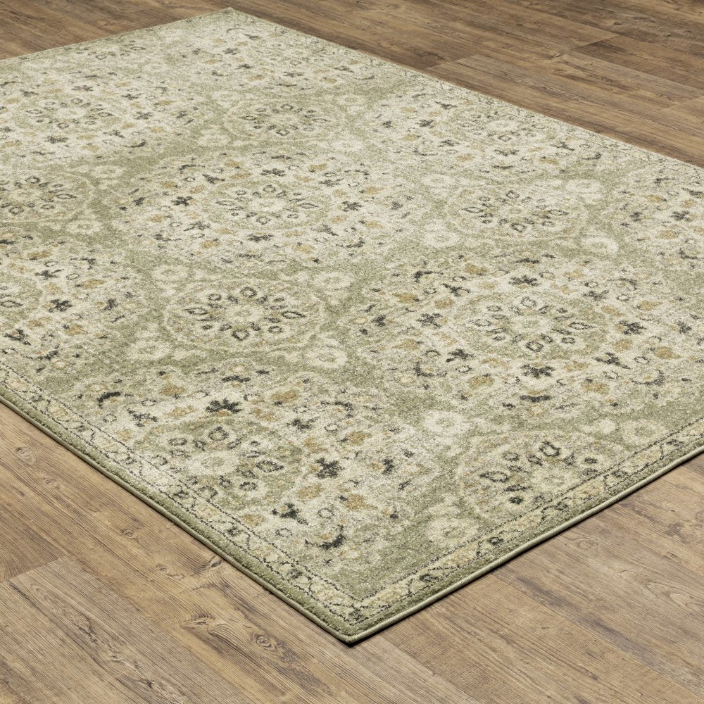 2' X 8' Green Ivory Grey And Tan Floral Power Loom Stain Resistant Runner Rug