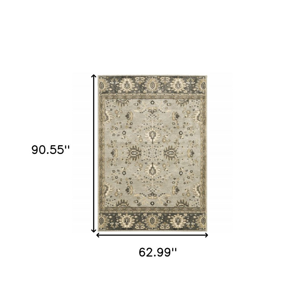 6' X 9' Grey Brown Tan And Beige Oriental Power Loom Stain Resistant Area Rug