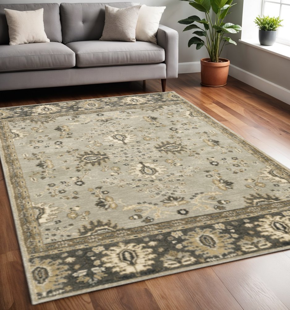 6' X 9' Grey Brown Tan And Beige Oriental Power Loom Stain Resistant Area Rug