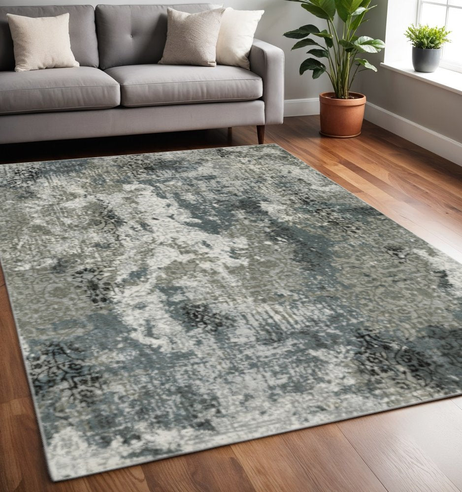 4' X 6' Ivory Grey Charcoal Blue And Navy Abstract Power Loom Stain Resistant Area Rug