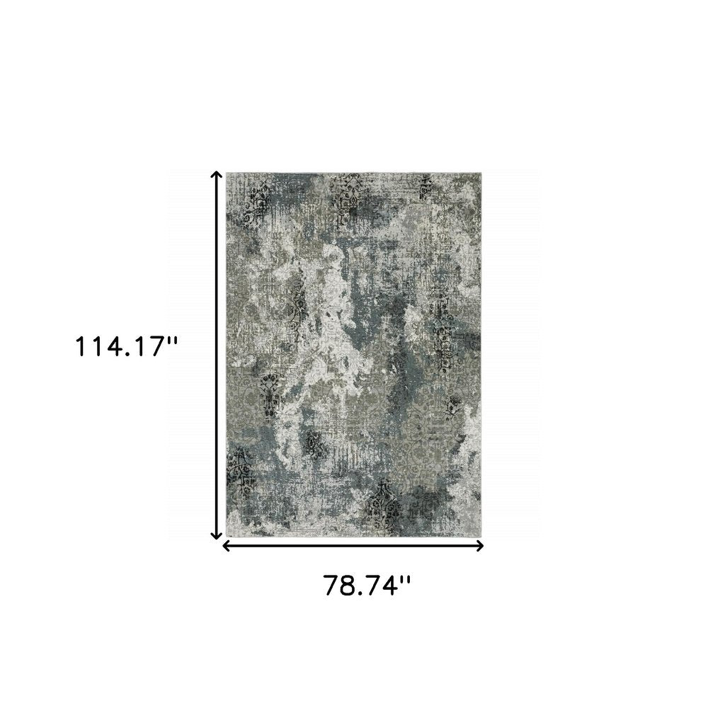 4' X 6' Ivory Grey Charcoal Blue And Navy Abstract Power Loom Stain Resistant Area Rug