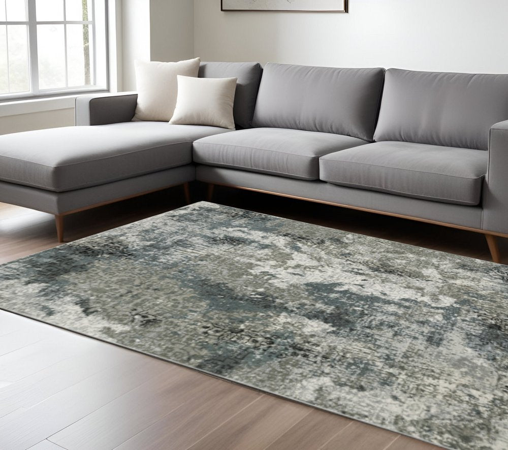 4' X 6' Ivory Grey Charcoal Blue And Navy Abstract Power Loom Stain Resistant Area Rug