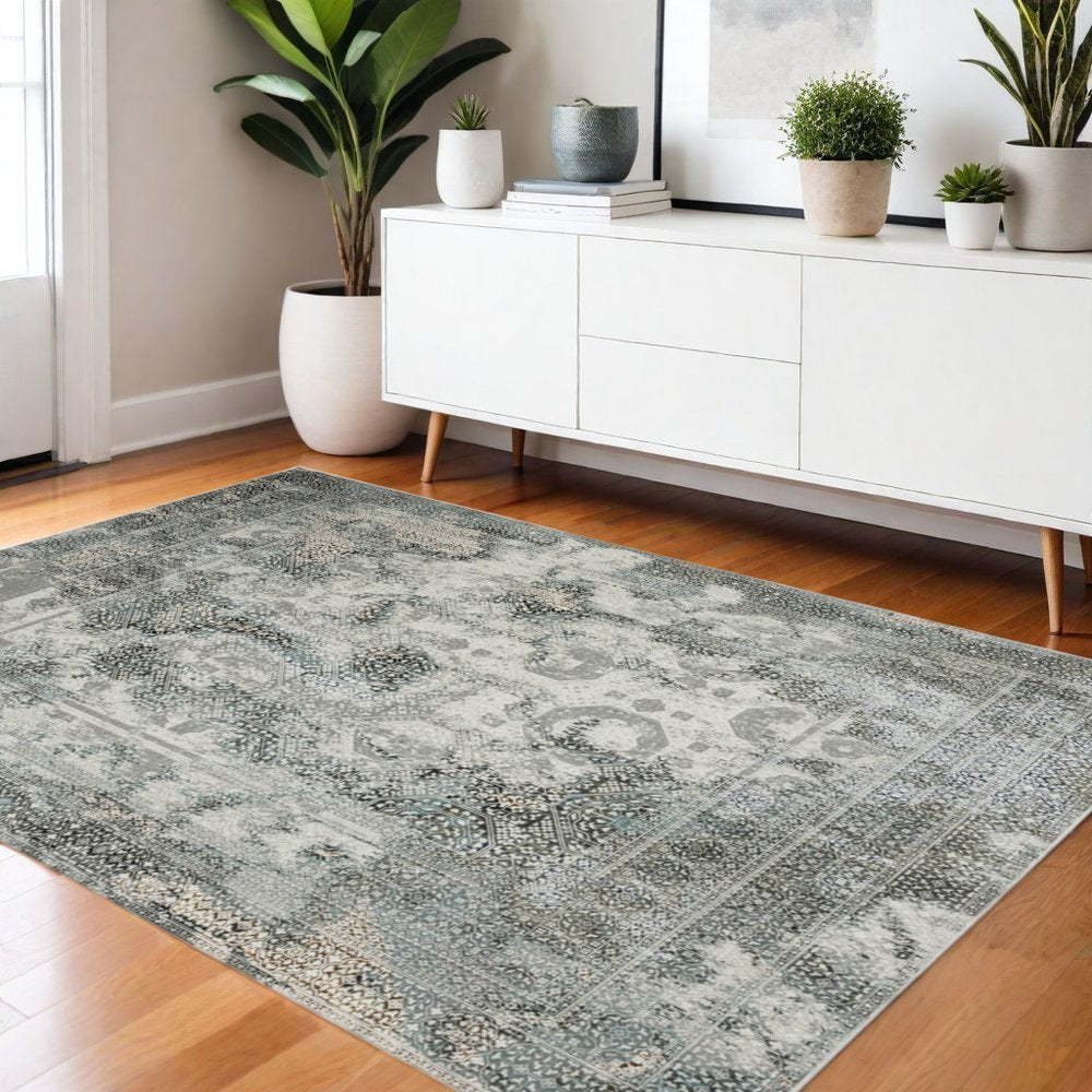 2' X 8' Ivory Grey Charcoal Blue And Rust Oriental Power Loom Stain Resistant Runner Rug