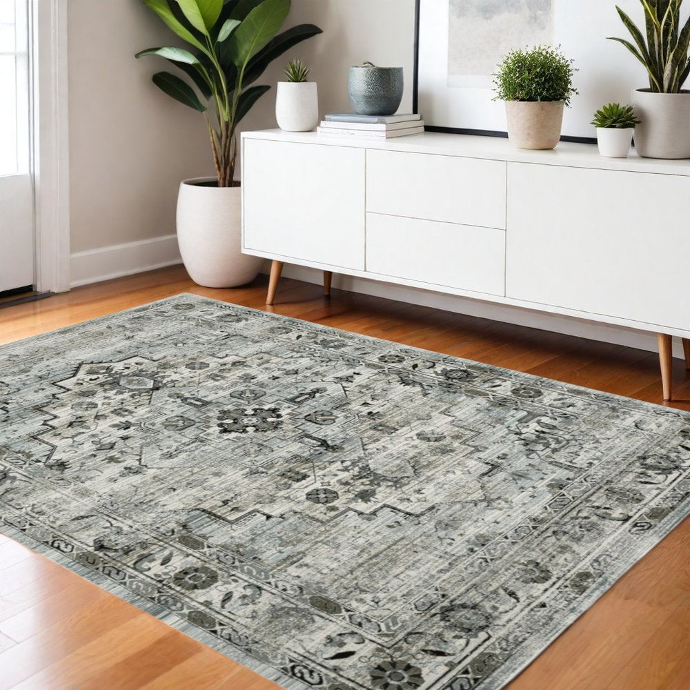 10' X 13' Ivory Grey Charcoal Blue And Taupe Oriental Power Loom Stain Resistant Area Rug