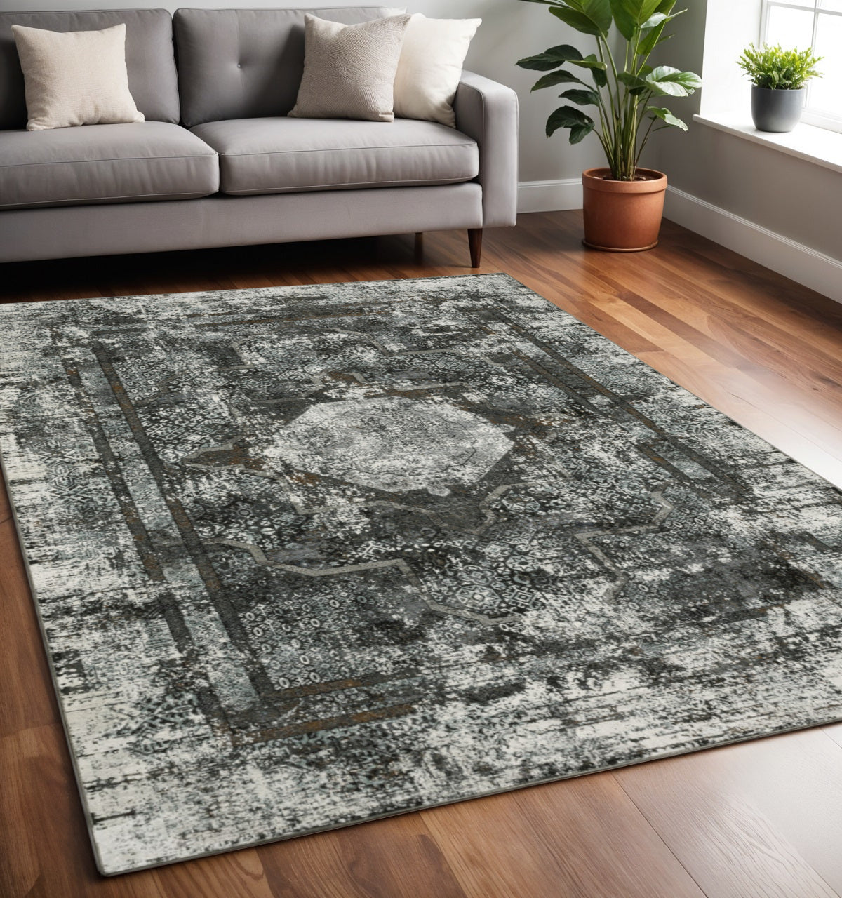 2' X 8' Charcoal Rust Grey Blue Ivory And Brown Oriental Power Loom Stain Resistant Runner Rug