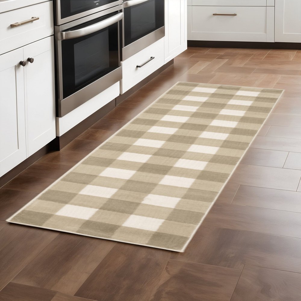 5' X 7' Beige And Ivory Geometric Power Loom Stain Resistant Area Rug