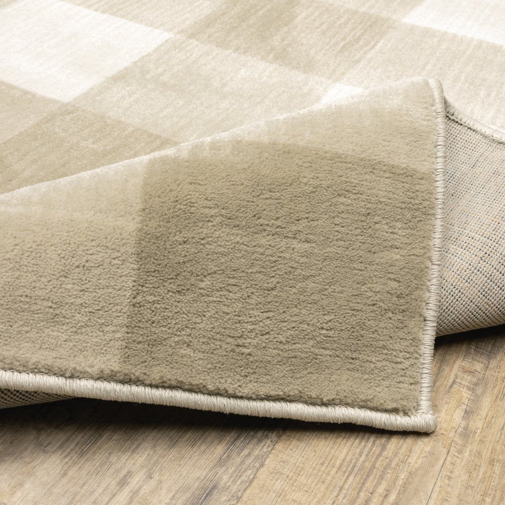 5' X 7' Beige And Ivory Geometric Power Loom Stain Resistant Area Rug