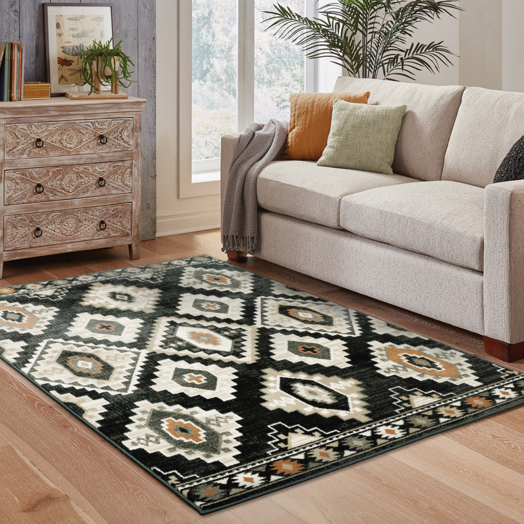 2' X 8' Black Grey Tan Orange And Ivory Southwestern Power Loom Stain Resistant Runner Rug