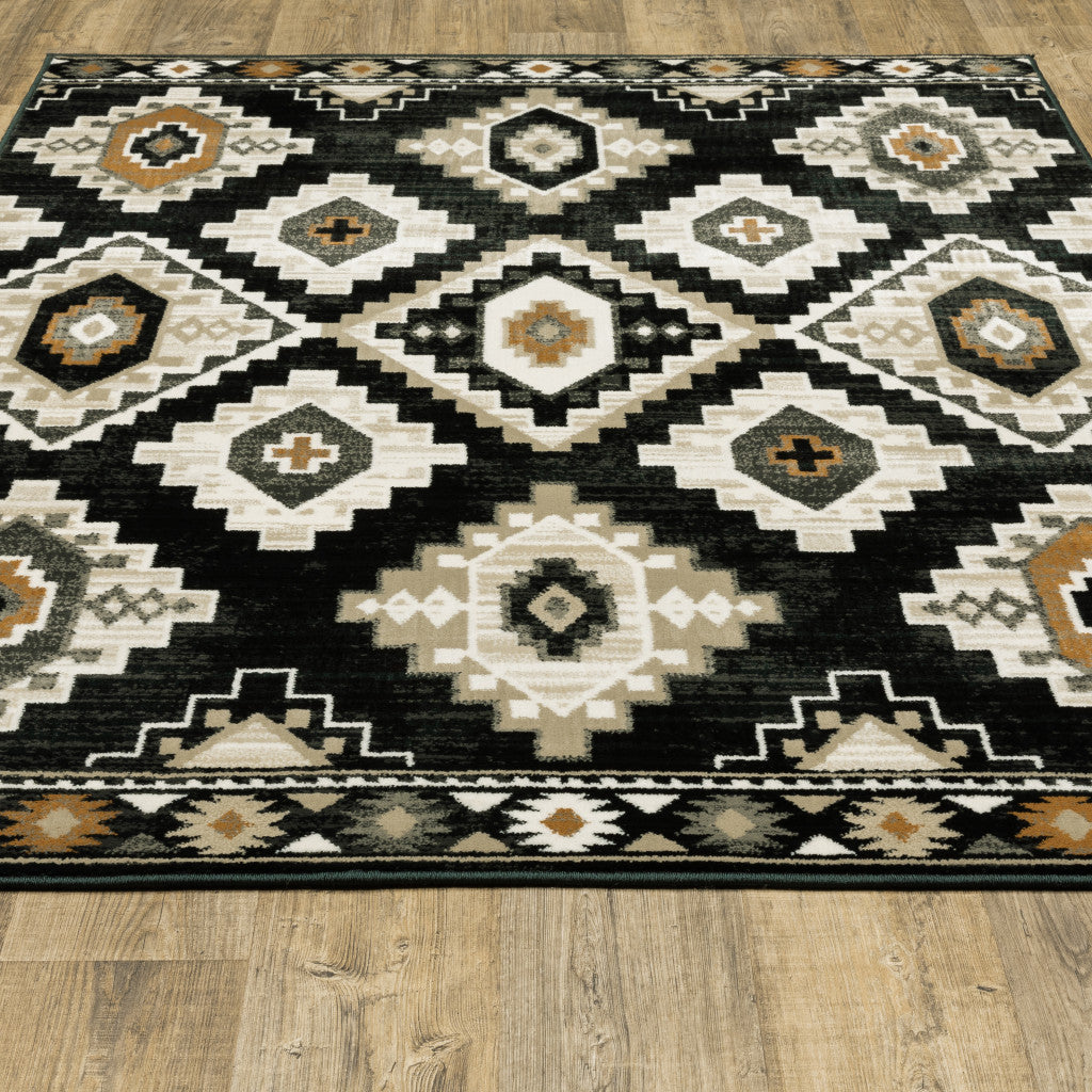 2' X 8' Black Grey Tan Orange And Ivory Southwestern Power Loom Stain Resistant Runner Rug