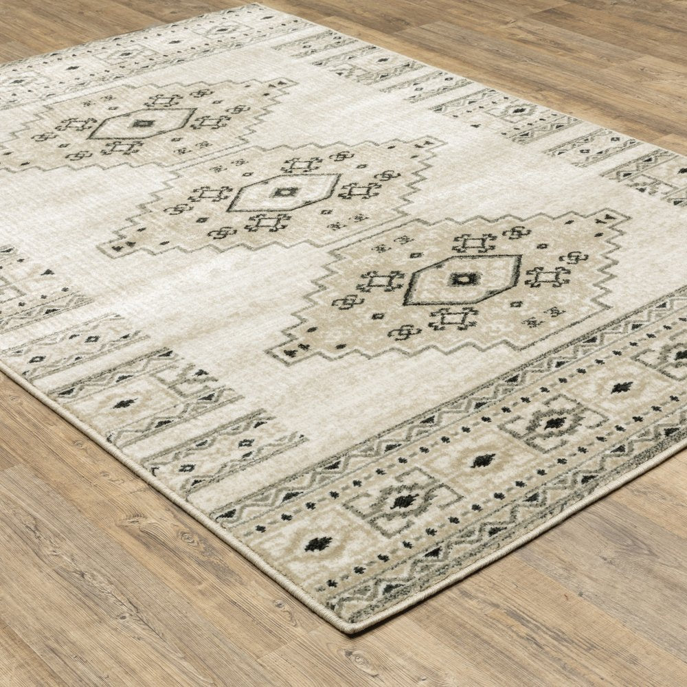 2' X 8' Ivory Grey Black And Ivory Southwestern Power Loom Stain Resistant Runner Rug