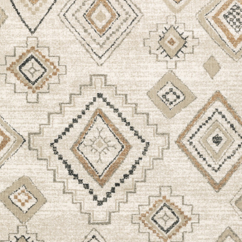 4' X 6' Ivory Orange Tan Black And Grey Southwestern Power Loom Stain Resistant Area Rug