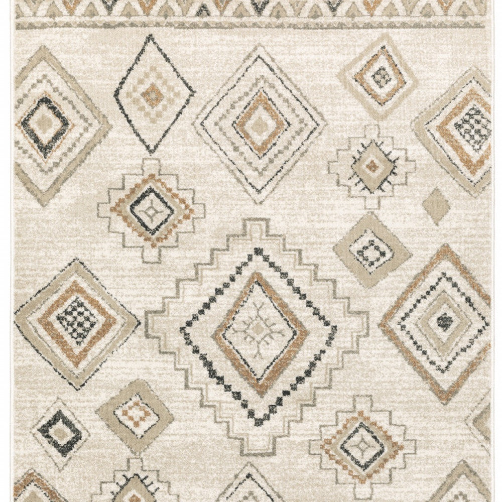 4' X 6' Ivory Orange Tan Black And Grey Southwestern Power Loom Stain Resistant Area Rug