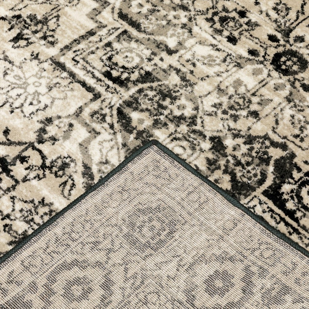 4' X 6' Black Grey Tan And Ivory Oriental Power Loom Stain Resistant Area Rug