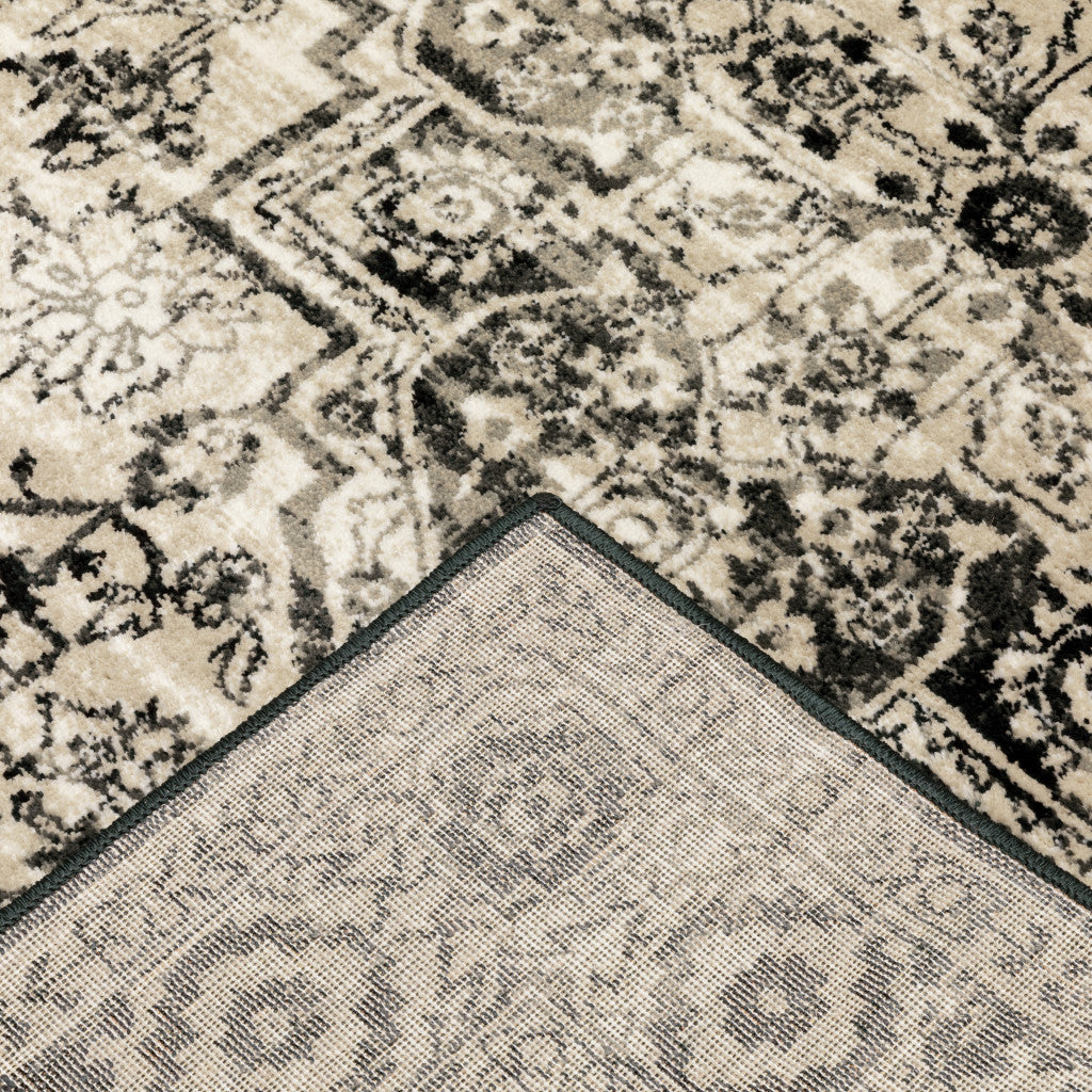 4' X 6' Black Grey Tan And Ivory Oriental Power Loom Stain Resistant Area Rug