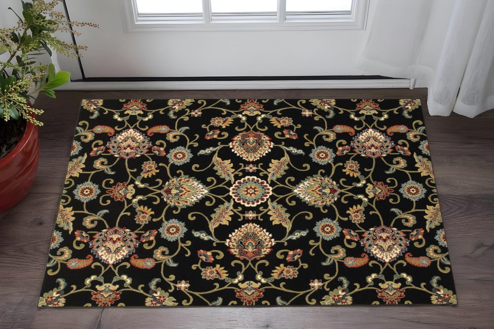 6' X 9' Black and Yellow Floral Power Loom Area Rug