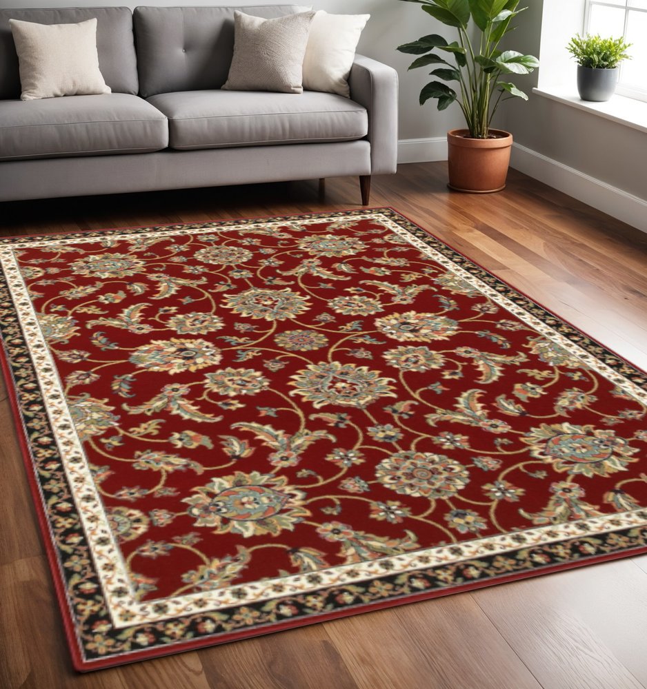 2' X 4' Red Black Blue Ivory Green And Salmon Oriental Power Loom Stain Resistant Area Rug