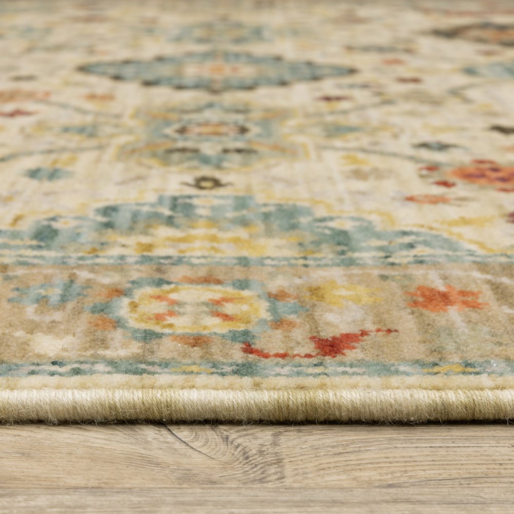 6' X 9' Beige Pale Blue Rust Gold Tan Brown And Orange Oriental Power Loom Stain Resistant Area Rug With Fringe