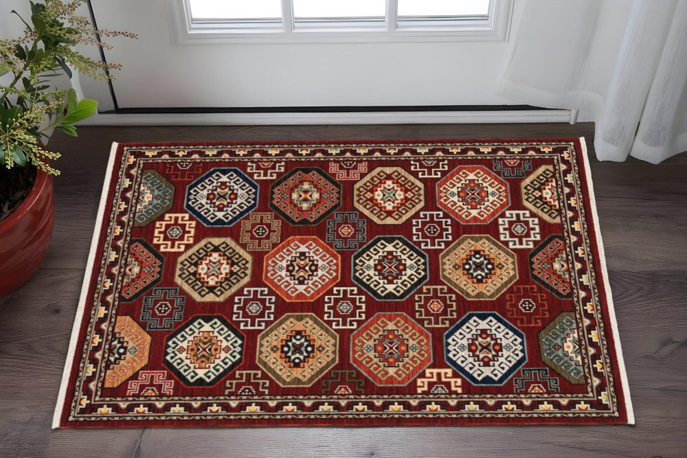 6' X 9' Red Blue Brown And Beige Oriental Power Loom Stain Resistant Area Rug With Fringe