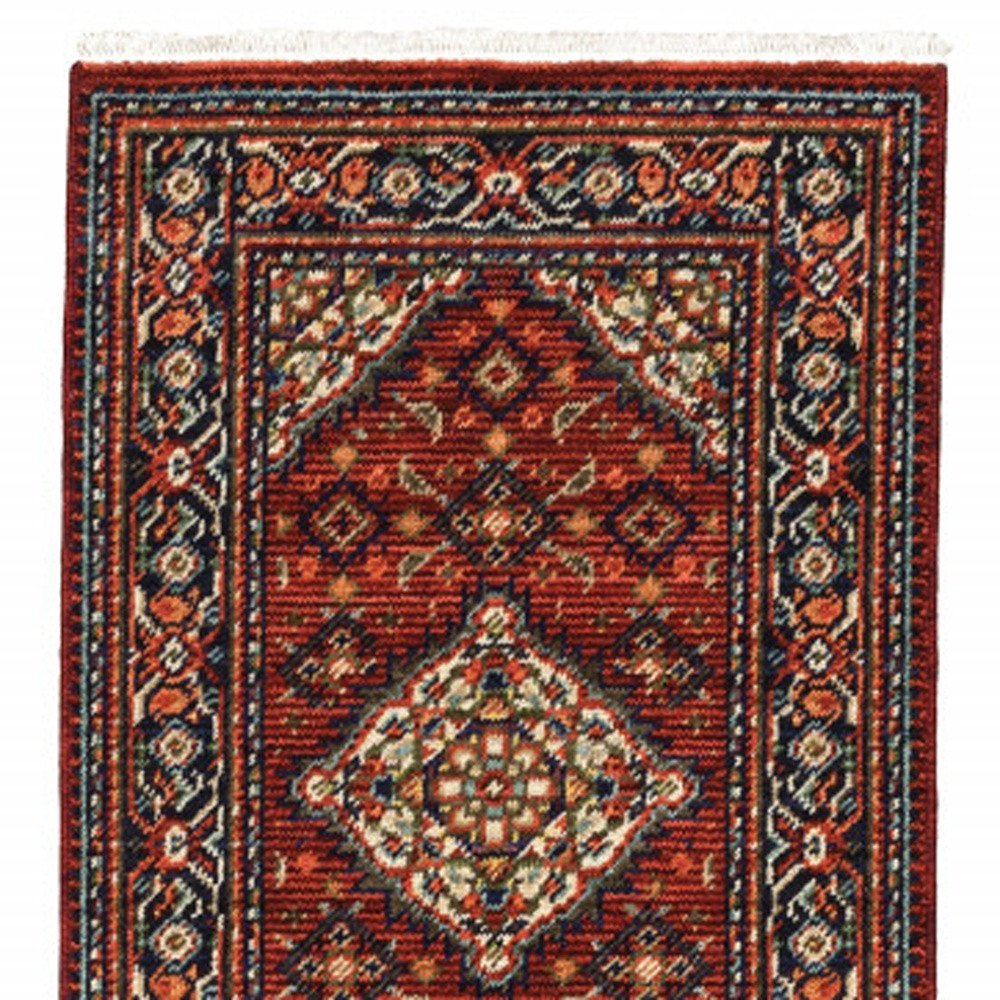 2' X 3' Red Blue Ivory And Orange Oriental Power Loom Stain Resistant Area Rug With Fringe