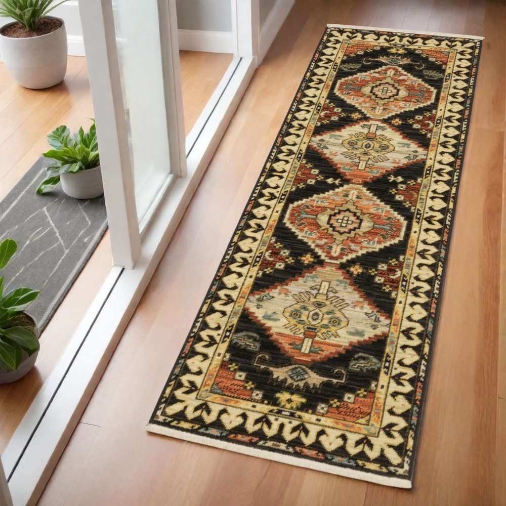 2' X 3' Charcoal Brown Orange Salmon Gold Navy Ivory And Pale Blue Oriental Power Loom Stain Resistant Area Rug With Fringe