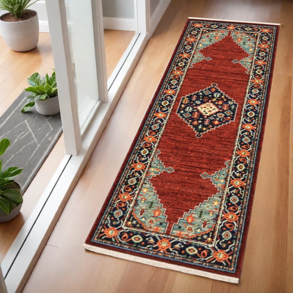 2' X 3' Red Blue Orange And Ivory Oriental Power Loom Stain Resistant Area Rug With Fringe