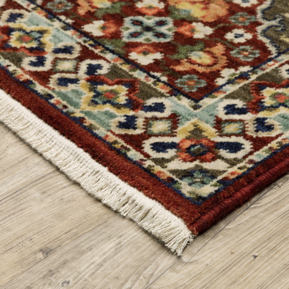 2' X 3' Red Rust Navy Light Blue Brown Orange Ivory And Gold Oriental Power Loom Stain Resistant Area Rug With Fringe