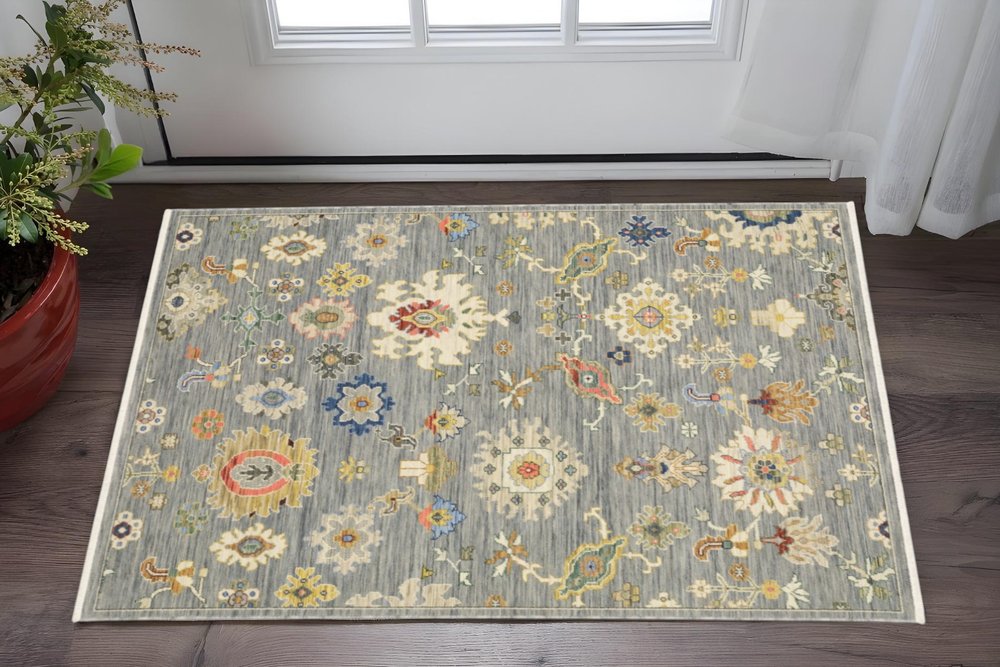 2' X 6' Grey Ivory Gold Salmon Red Blue And Green Oriental Power Loom Stain Resistant Runner Rug With Fringe