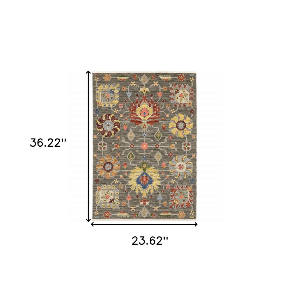 8' X 11' Grey Charcoal Yellow Blue Rust Red Pink Green And Ivory Oriental Power Loom Stain Resistant Area Rug With Fringe
