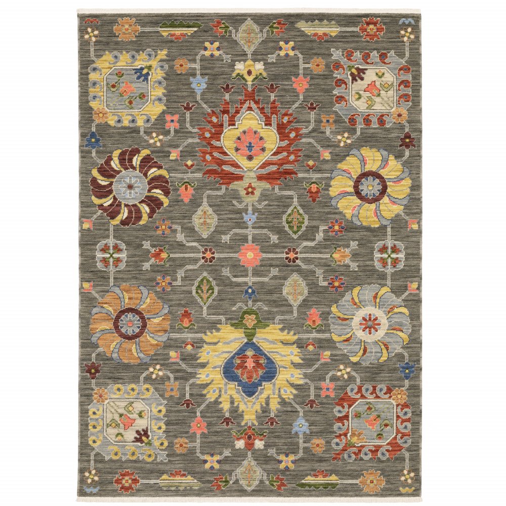 8' X 11' Grey Charcoal Yellow Blue Rust Red Pink Green And Ivory Oriental Power Loom Stain Resistant Area Rug With Fringe