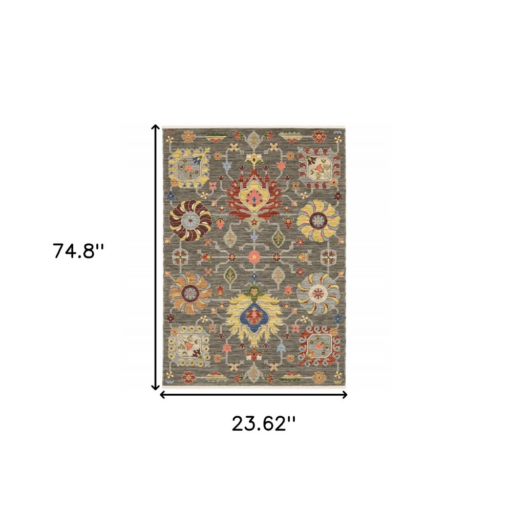 8' X 11' Grey Charcoal Yellow Blue Rust Red Pink Green And Ivory Oriental Power Loom Stain Resistant Area Rug With Fringe