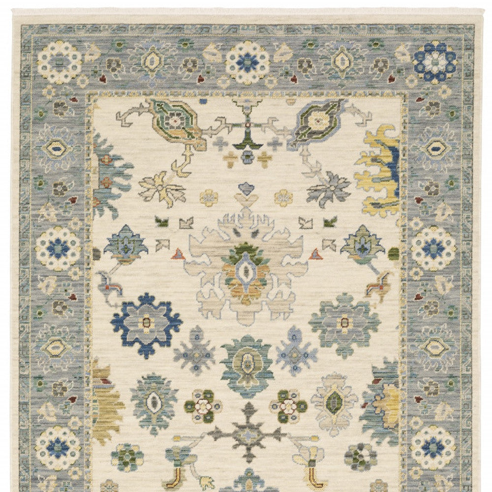 2' X 3' Blue Grey Gold Green Pink Orange Ivory And Red Oriental Power Loom Stain Resistant Area Rug With Fringe