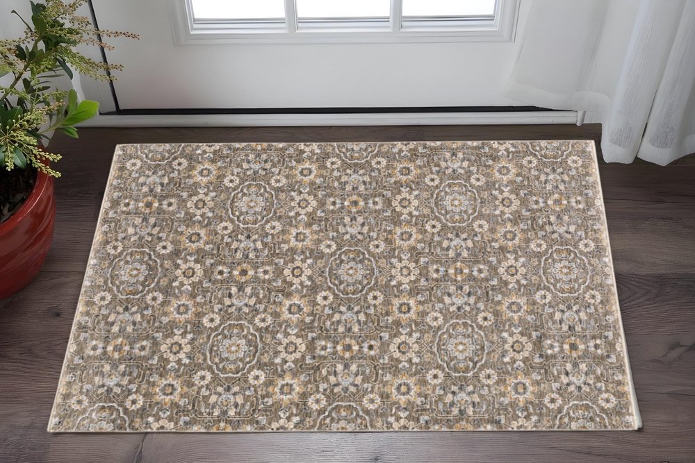 2' X 3' Grey And Tan Floral Power Loom Stain Resistant Area Rug With Fringe