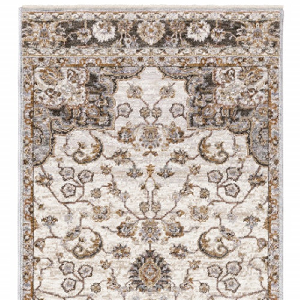 2' X 8' Ivory And Blue Oriental Power Loom Stain Resistant Runner Rug With Fringe