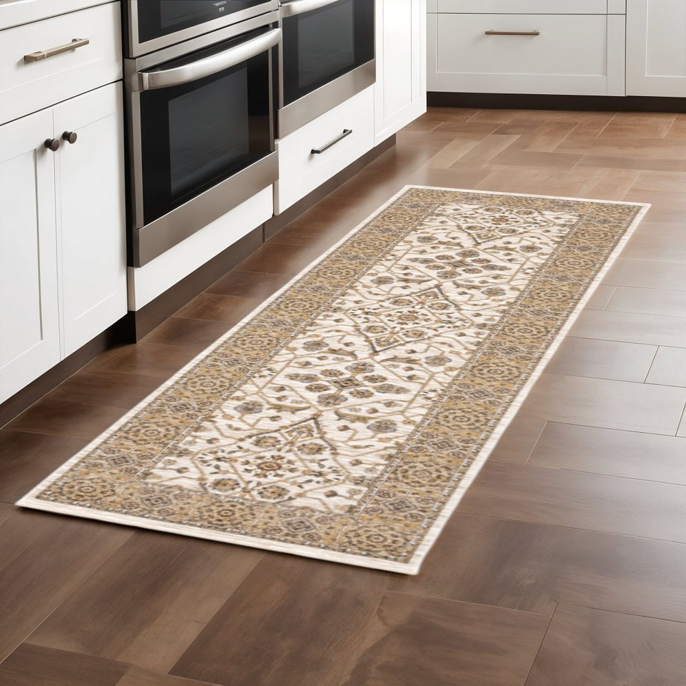 2' X 3' Ivory And Gold Oriental Power Loom Stain Resistant Area Rug With Fringe