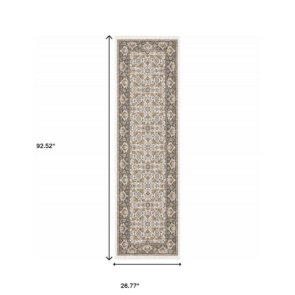 2' X 3' Ivory And Grey Oriental Power Loom Stain Resistant Area Rug With Fringe