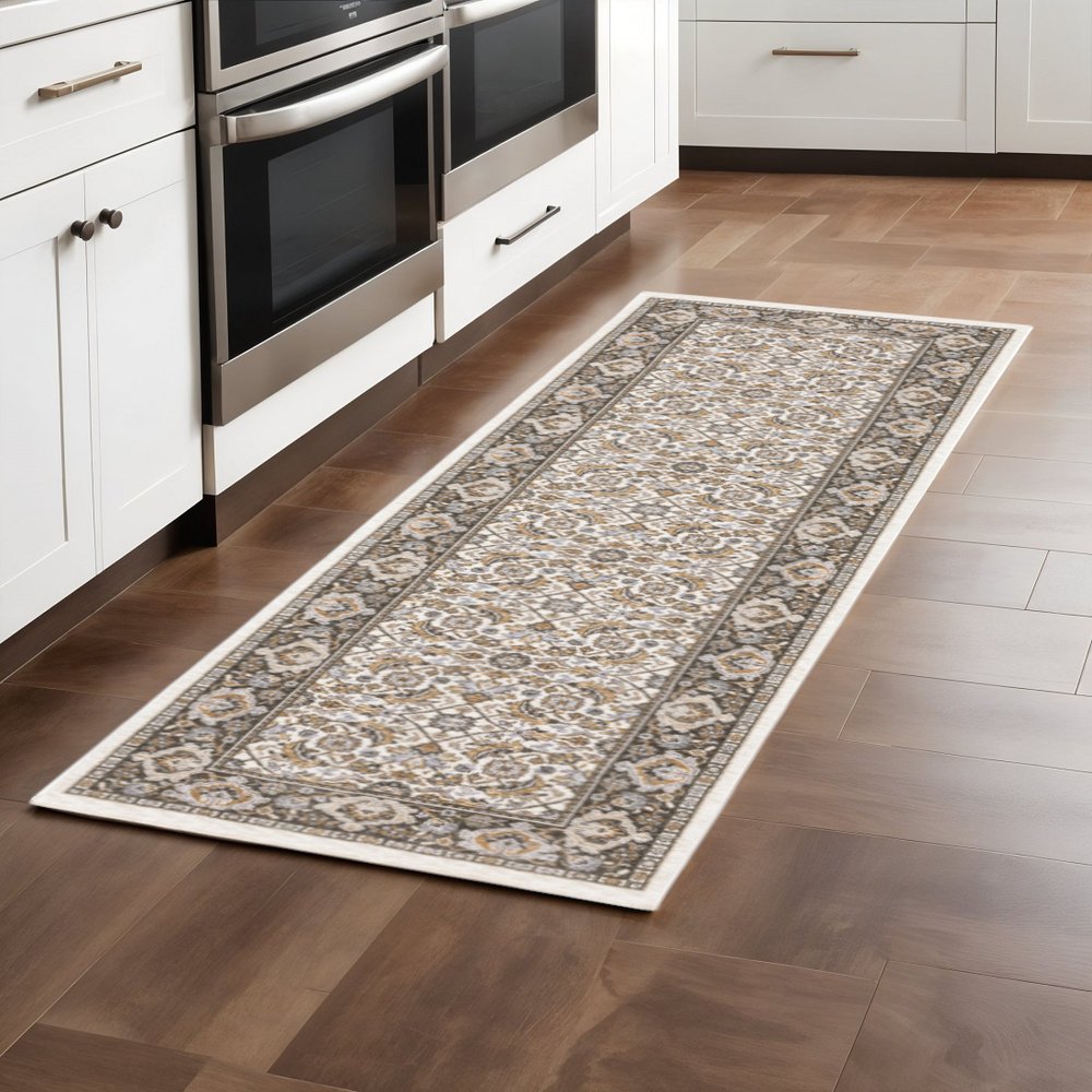 2' X 3' Ivory And Grey Oriental Power Loom Stain Resistant Area Rug With Fringe