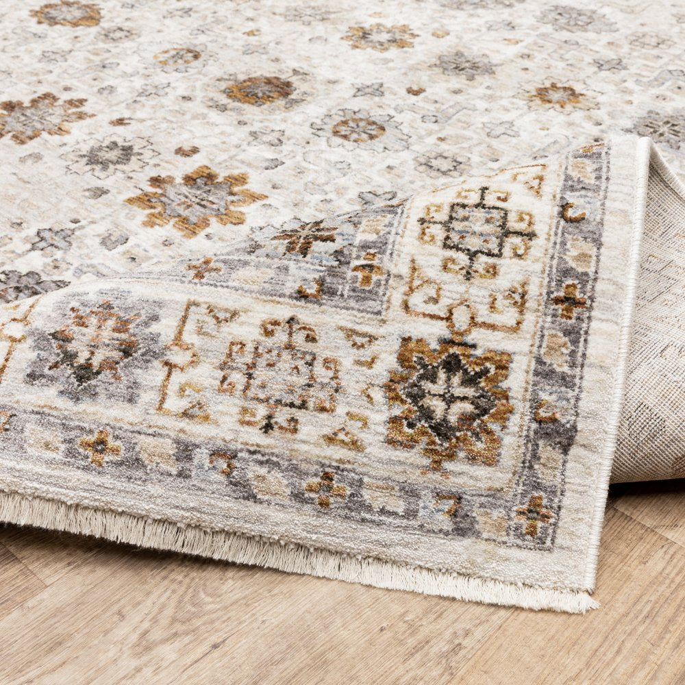 3' X 5' Grey And Ivory Oriental Power Loom Stain Resistant Area Rug With Fringe