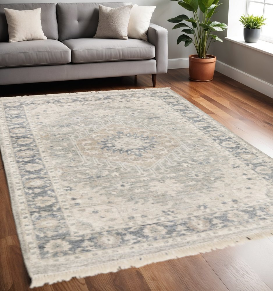 8' X 10' Beige And Grey Oriental Hand Loomed Stain Resistant Area Rug With Fringe