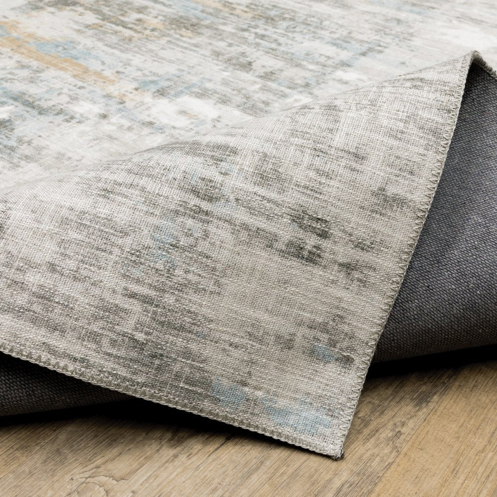 9' X 12' Beige And Gray Abstract Distressed Area Rug