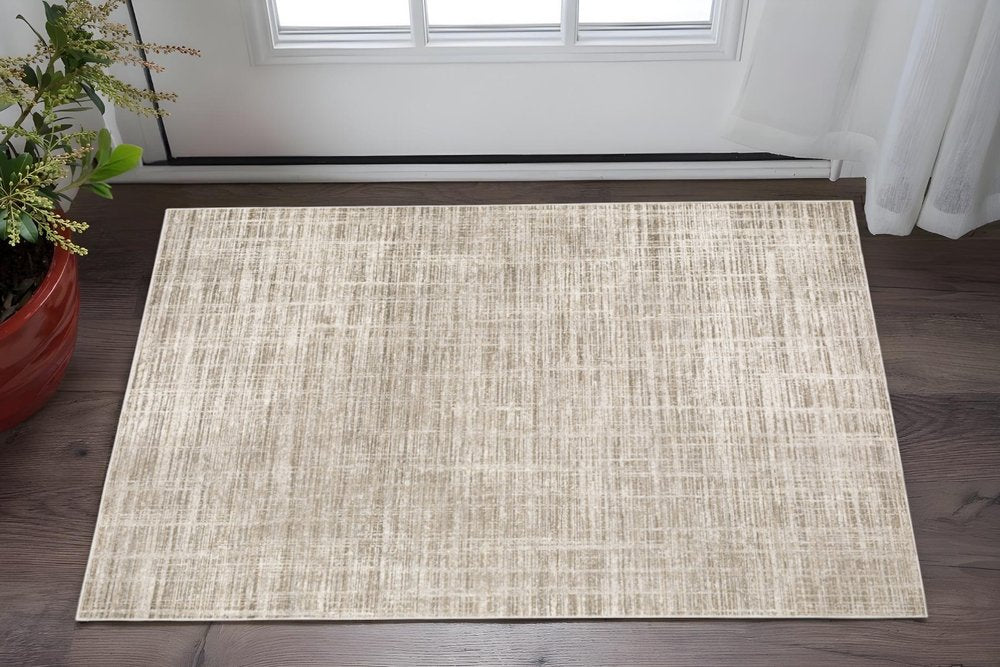 2' X 8' Beige Grey Ivory Tan And Brown Abstract Power Loom Stain Resistant Runner Rug
