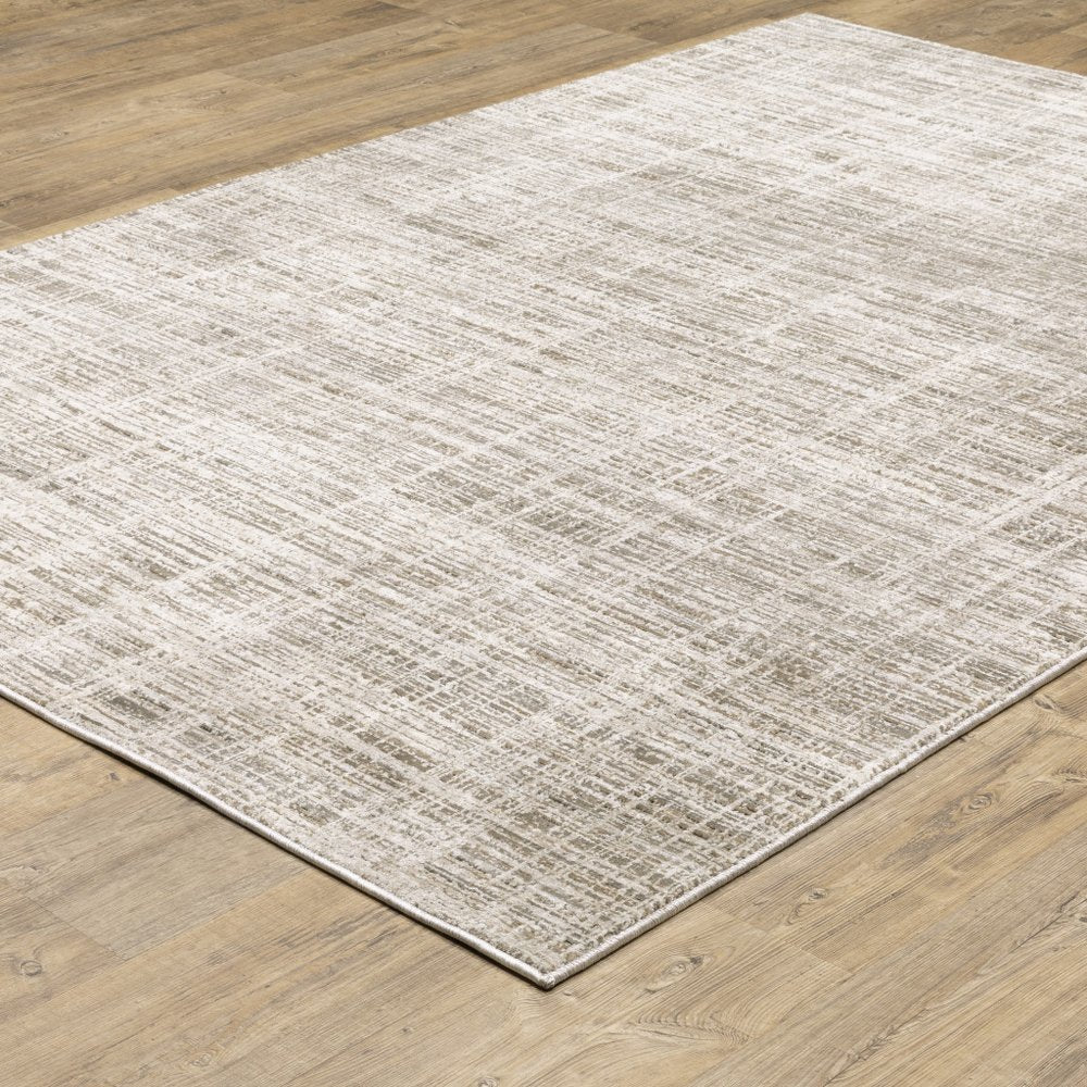 2' X 8' Beige Grey Ivory Tan And Brown Abstract Power Loom Stain Resistant Runner Rug