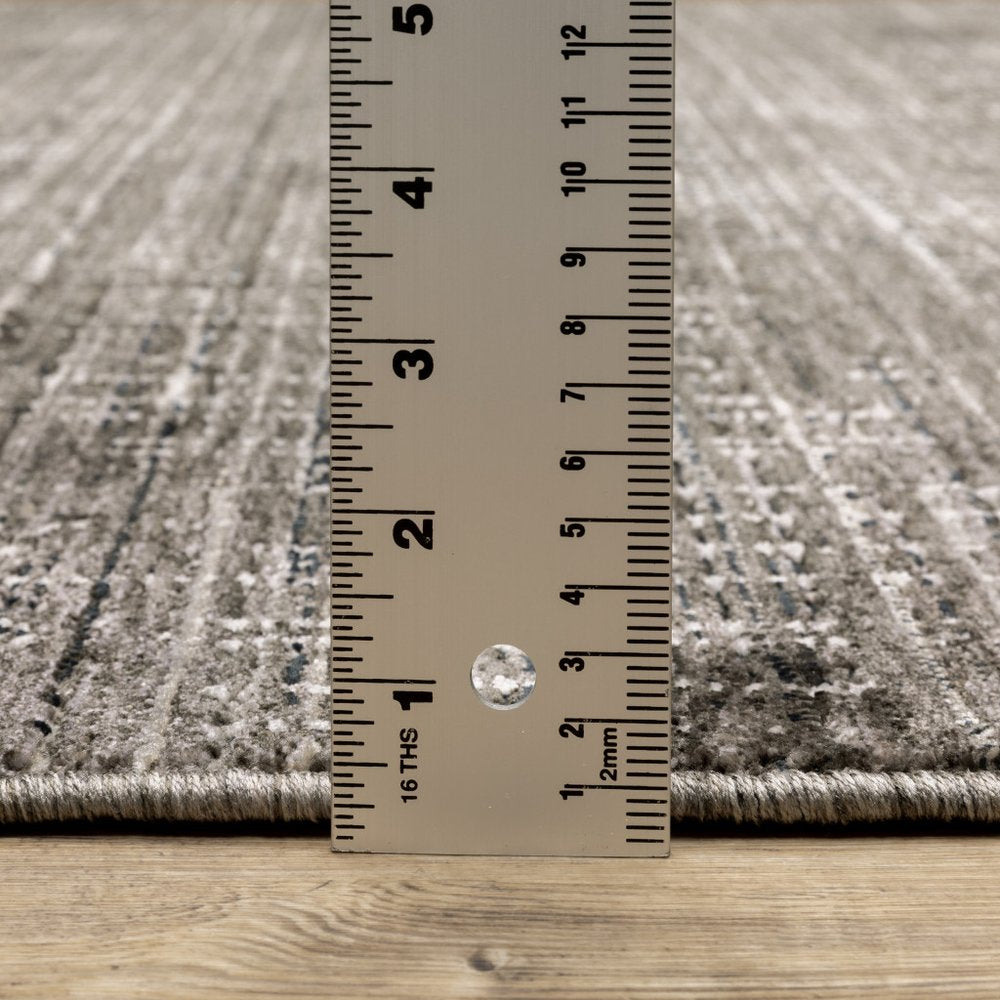 10' X 13' Charcoal Grey Grey Ivory Tan And Brown Abstract Power Loom Stain Resistant Area Rug