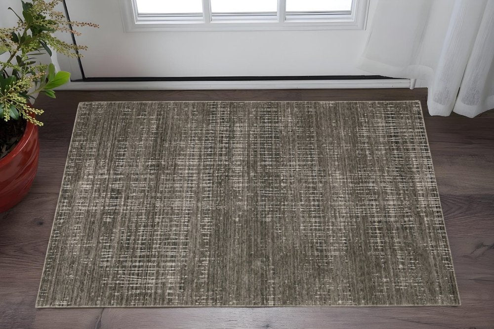 10' X 13' Charcoal Grey Grey Ivory Tan And Brown Abstract Power Loom Stain Resistant Area Rug