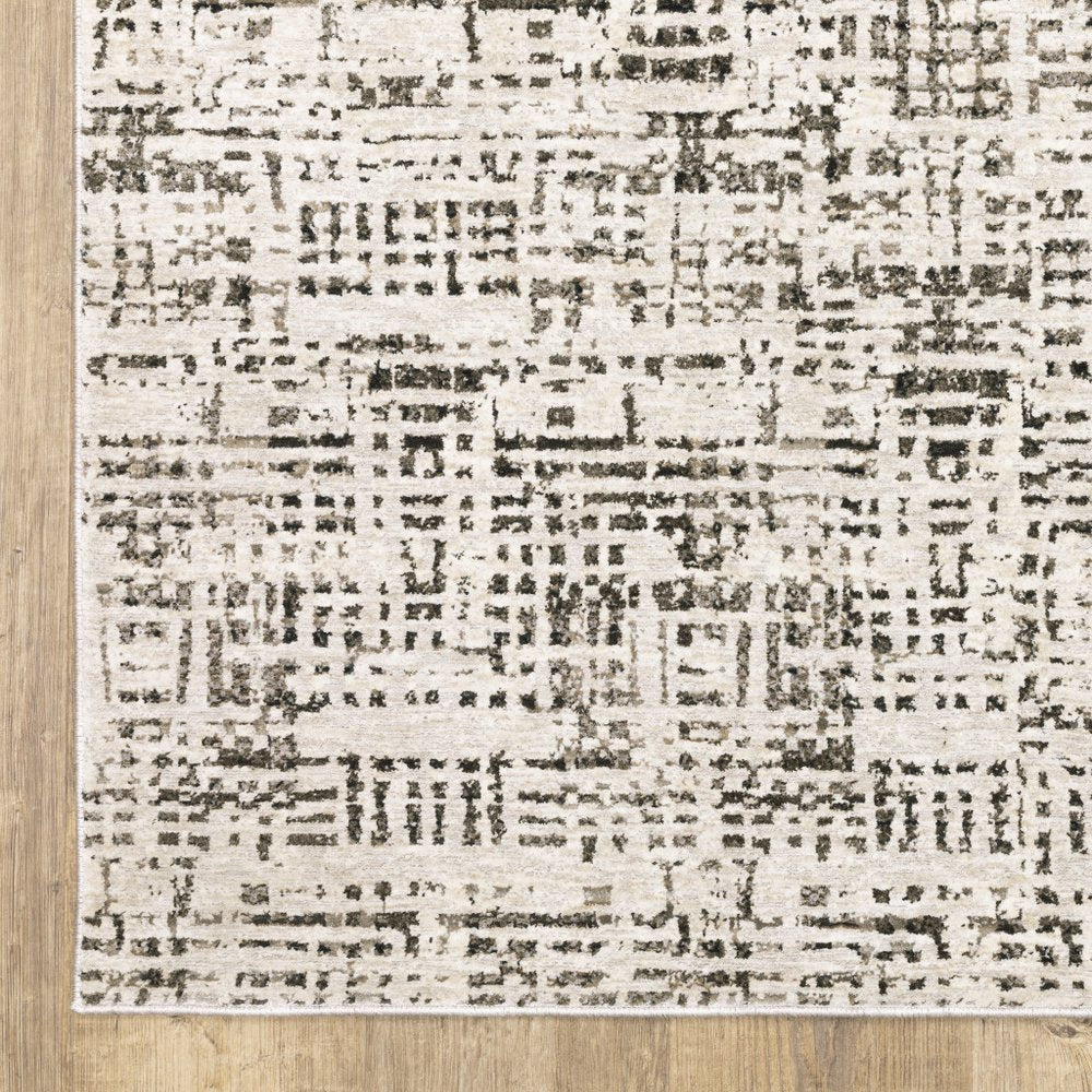 8' X 11' Ivory And Gray Abstract Area Rug