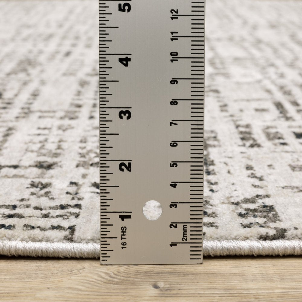 8' X 11' Ivory And Gray Abstract Area Rug