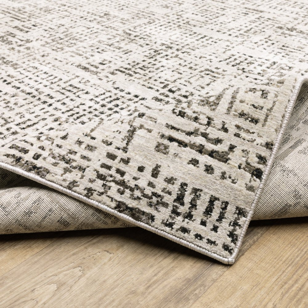 8' X 11' Ivory And Gray Abstract Area Rug