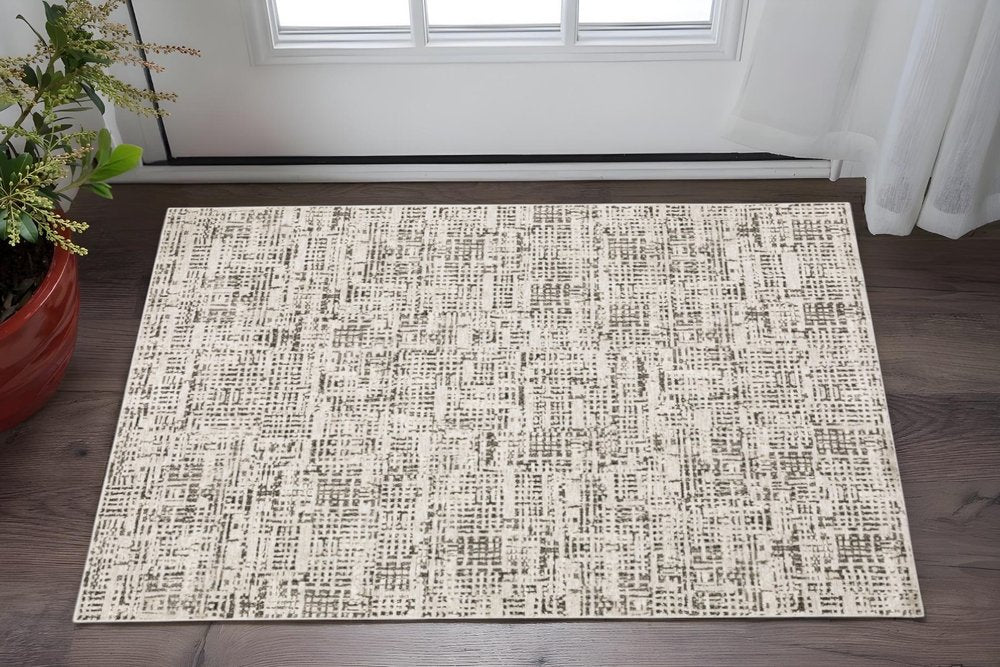 8' X 11' Ivory And Gray Abstract Area Rug