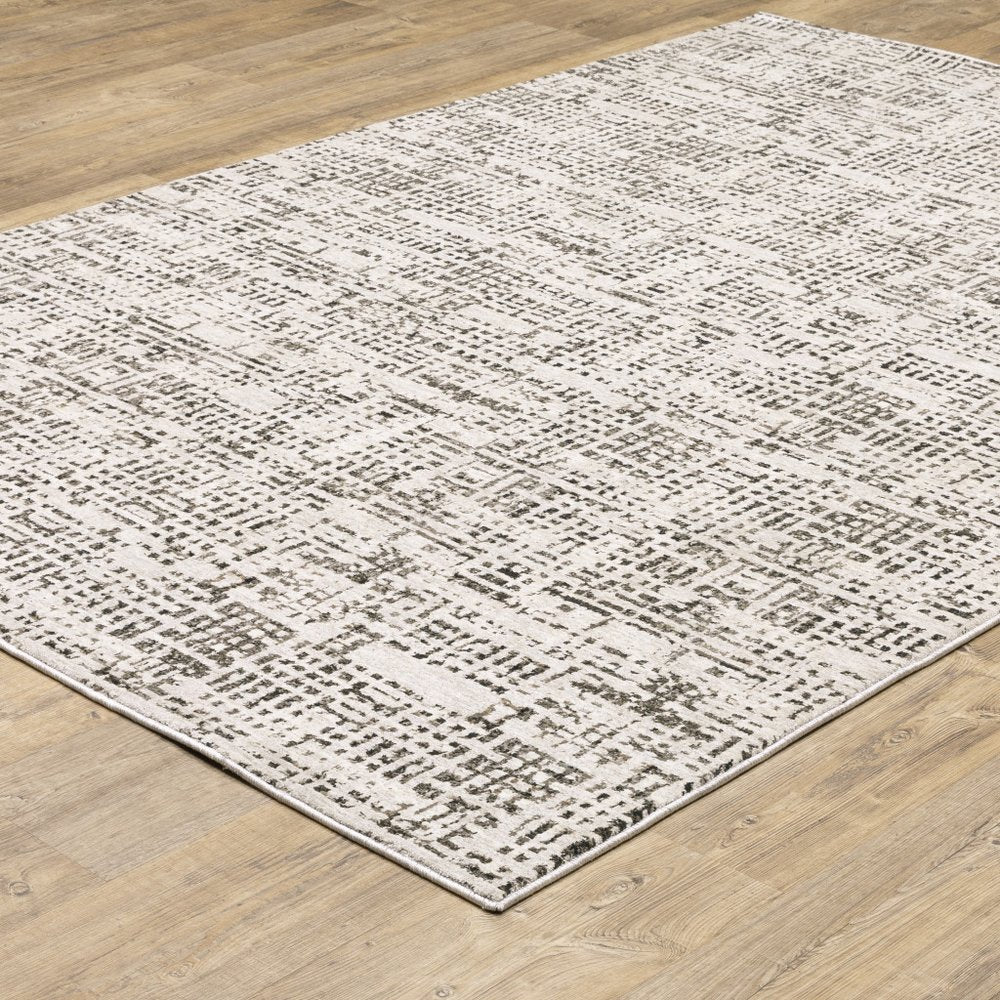 8' X 11' Ivory And Gray Abstract Area Rug
