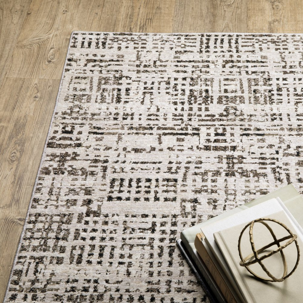 8' X 11' Ivory And Gray Abstract Area Rug