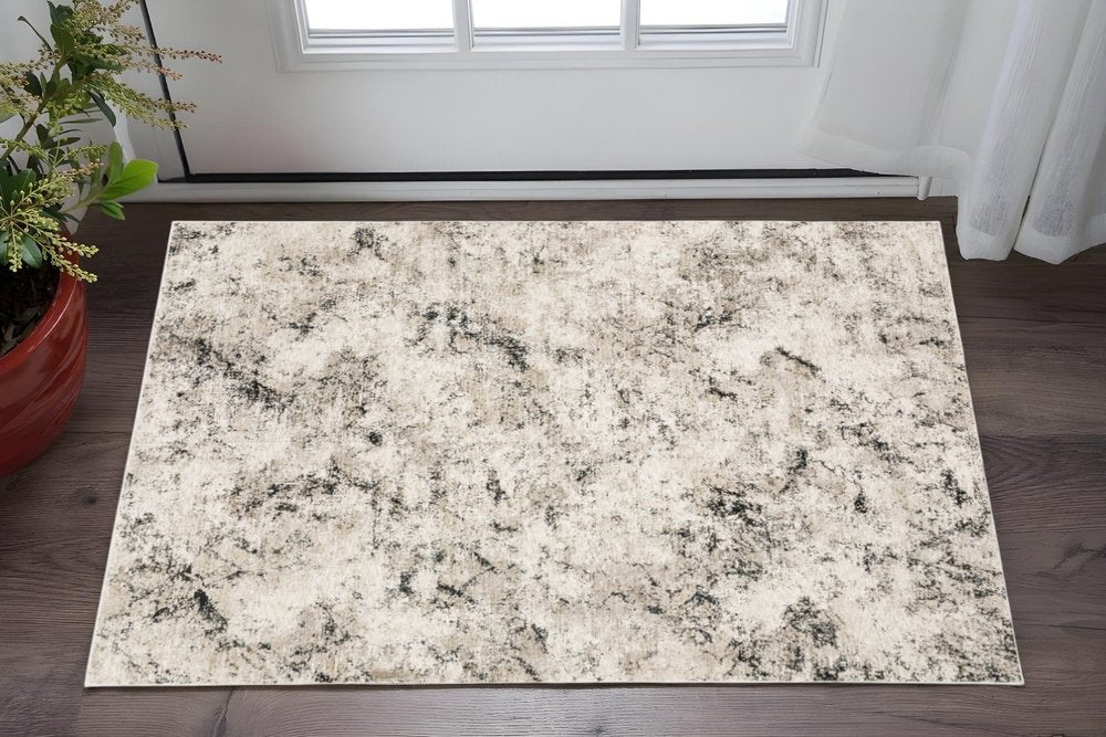 8' X 11' Ivory And Gray Abstract Area Rug